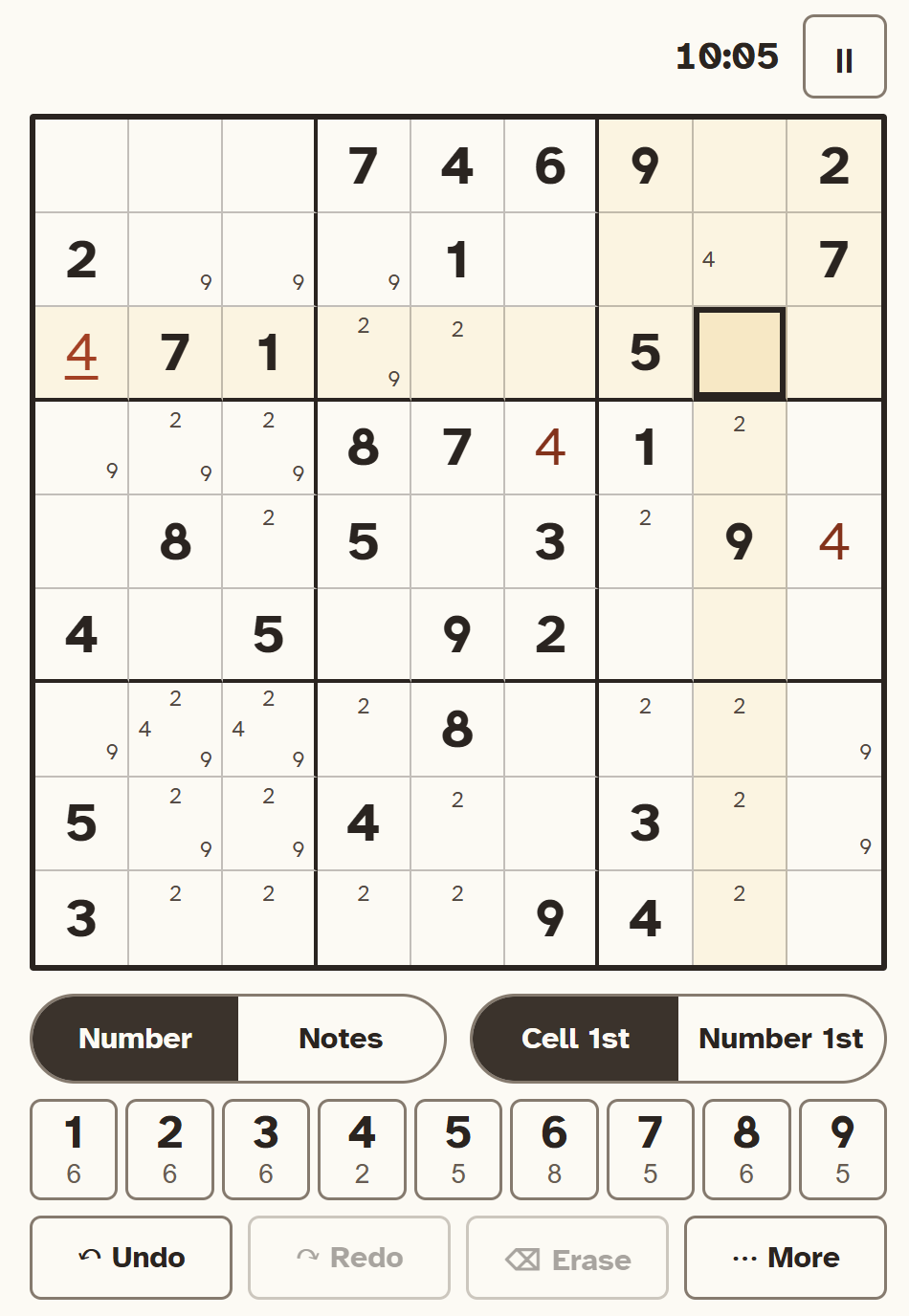 The Sudoku player mid-solve, with highlighted row, column and box, pencil marks in some cells, and the number pad below